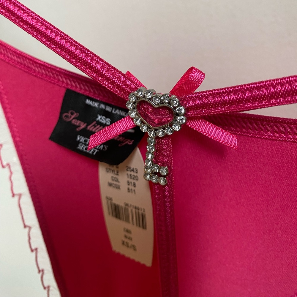 Victoria's Secret Hot Pink thong with rhinstone Key Charm